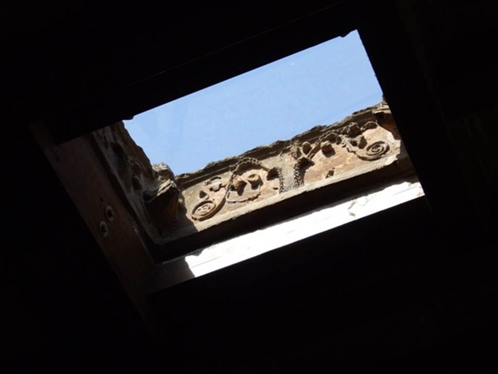 I.10.16 Pompeii.  March 2009.  Atrium.  Terracotta Compluvium.  Decorated relief on side which has satyr’s head missing.