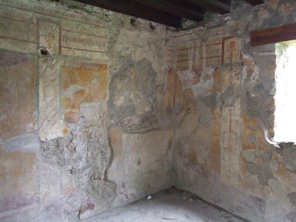 I.11.11 Pompeii. December 2006. North-east corner of room, and window overlooking garden