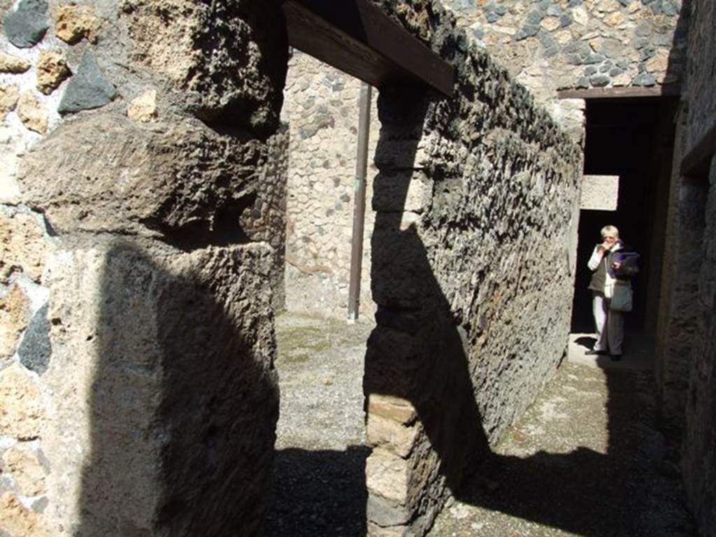 I.12.2 and I.12.1 Pompeii.  March 2009.  Corridor leading north from room 11, with doorway to room 17.