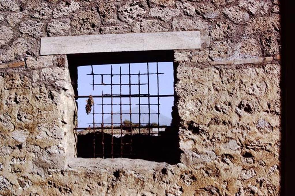 I.12.8 Pompeii. 1972. Window with grating. Photo by Stanley A. Jashemski. 
Source: The Wilhelmina and Stanley A. Jashemski archive in the University of Maryland Library, Special Collections (See collection page) and made available under the Creative Commons Attribution-Non Commercial License v.4. See Licence and use details. J72f0602
