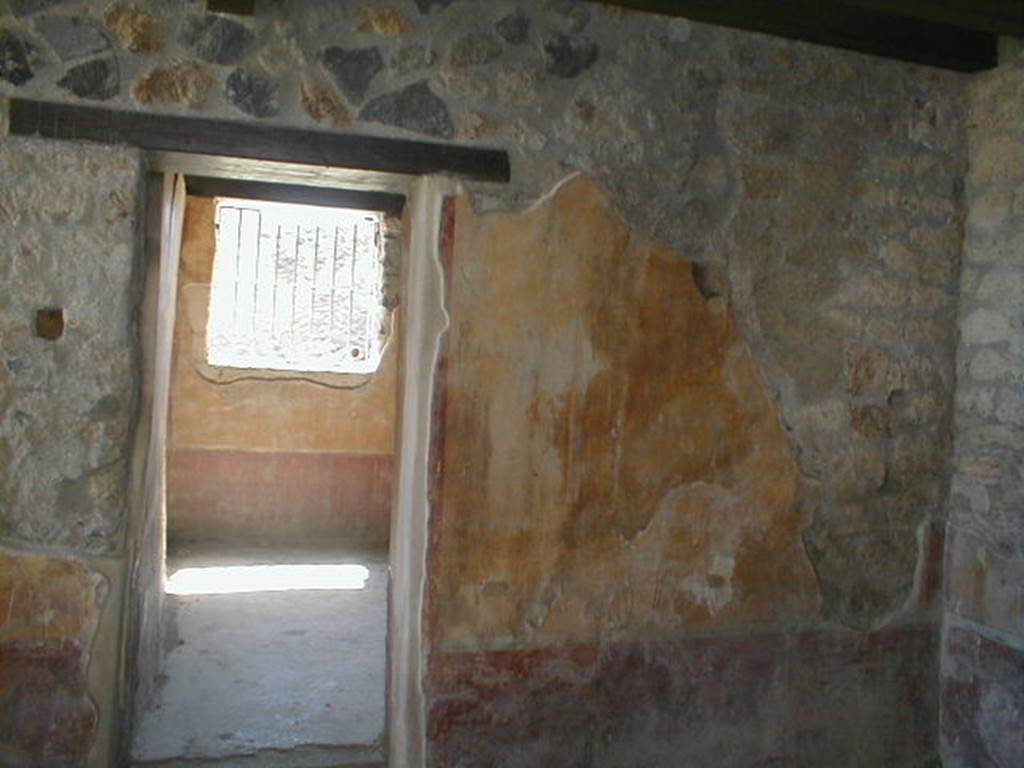 I.13.9 Pompeii. May 2005. West wall of atrium, and north-west corner.