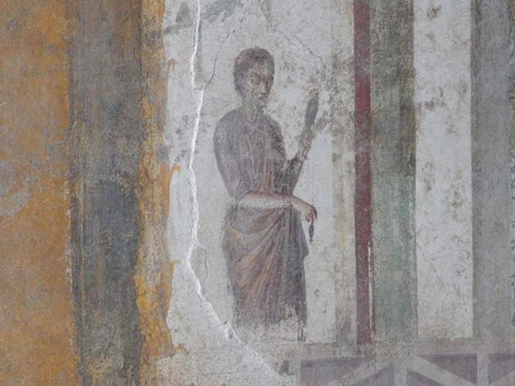 II.3.3 Pompeii. May 2016. Room 9, detail of figure from west end of north wall. Photo courtesy of Buzz Ferebee.
