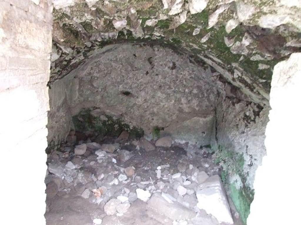 II.6 Pompeii. December 2006. Small dark room on west side of entrance corridor of Amphitheatre, possibly a storeroom.