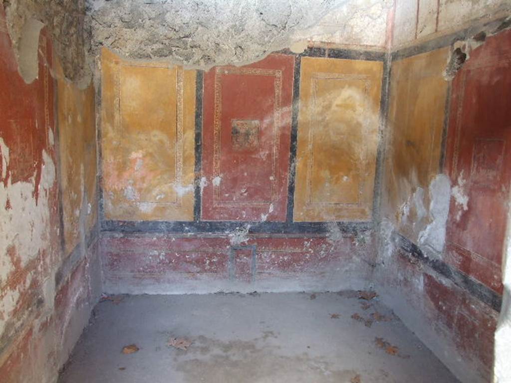 II.8.6 Pompeii. December 2018. 
West (left) wall in photo above, in room with painted walls. Photo courtesy of Aude Durand.


