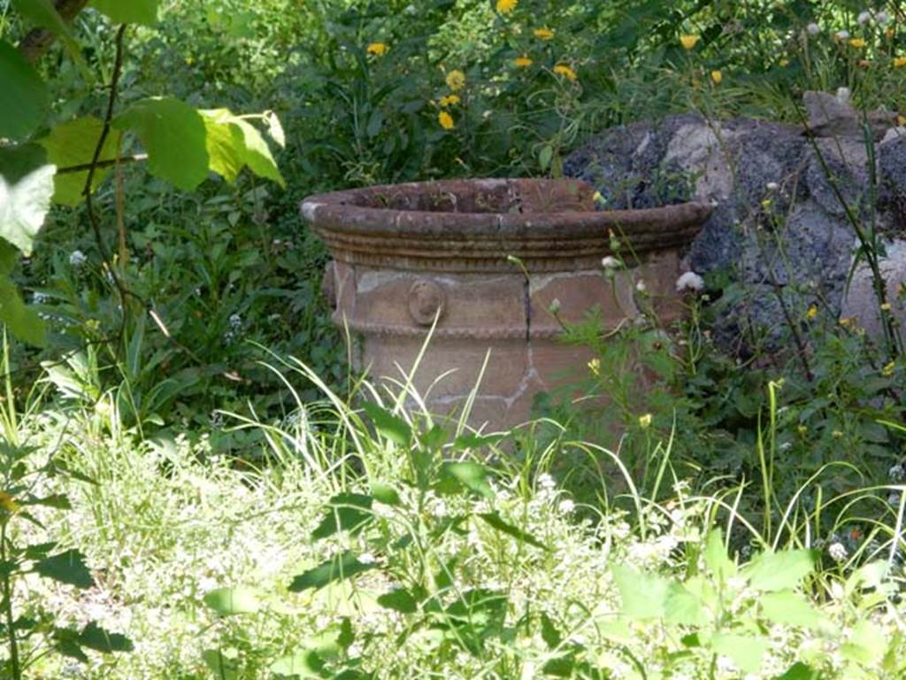 II.9.4, Pompeii. May 2018. Terracotta puteal near triclinium. Photo courtesy of Buzz Ferebee. 