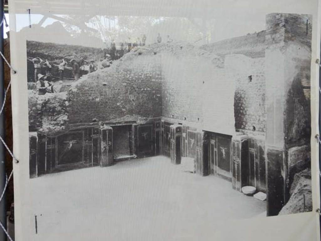 III.3.6 Pompeii. May 2018. Old photograph in display exhibition, looking towards north wall, on left, rear doorway, centre and east wall, on right. Photo courtesy of Buzz Ferebee.
