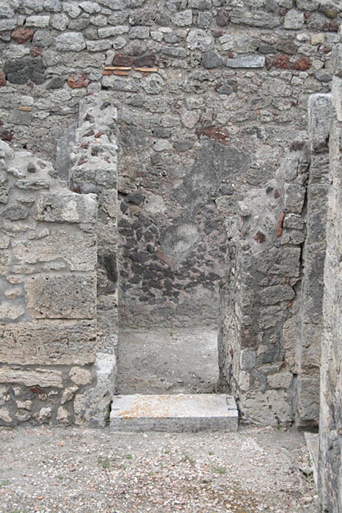 V.1.7 Pompeii. c.2005-7.  
Room “12”, looking towards doorway on east wall in south-east corner of peristyle “b”. Photo by Thomas Staub.
Photo courtesy of Swedish Pompeii Project.
