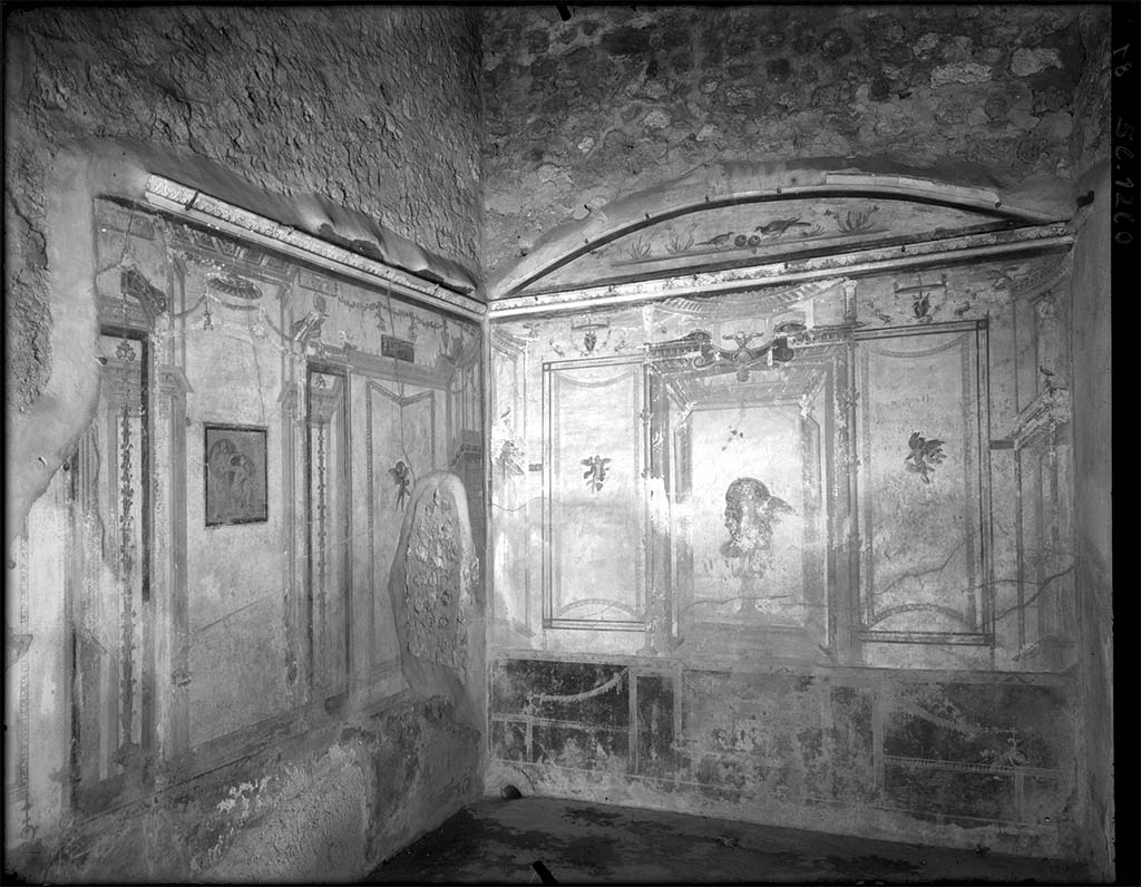 V.2.1 Pompeii. Old undated photograph. Room 8, south-west corner.
In the centre of the south wall (on left) is a painting of Poseidon and Amymone.
In the centre of the west wall (on right) is a painting of Leda and the swan in the central panel.
DAIR 56.1260, Photo  Deutsches Archologisches Institut, Abteilung Rom, Arkiv. 

