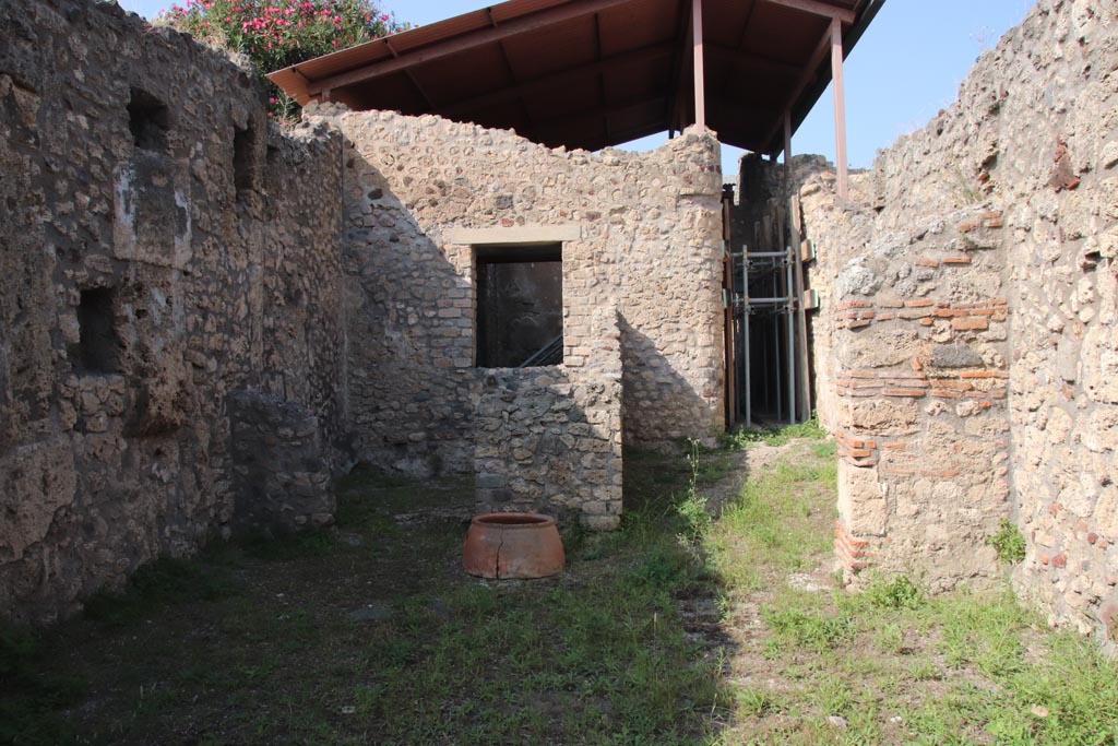 V.3.6 Pompeii. October 2023. Looking north across shop-room towards dwelling at rear. Photo courtesy of Klaus Heese.