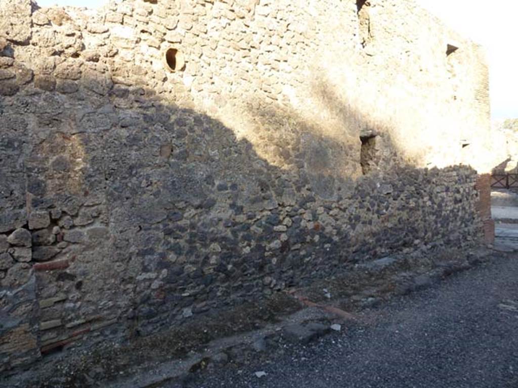 V.4.1 Pompeii. June 2012. Looking south-east in Vicolo di M L Frontone towards corner with Via di Nola, on right. Photo courtesy of Michael Binns.
