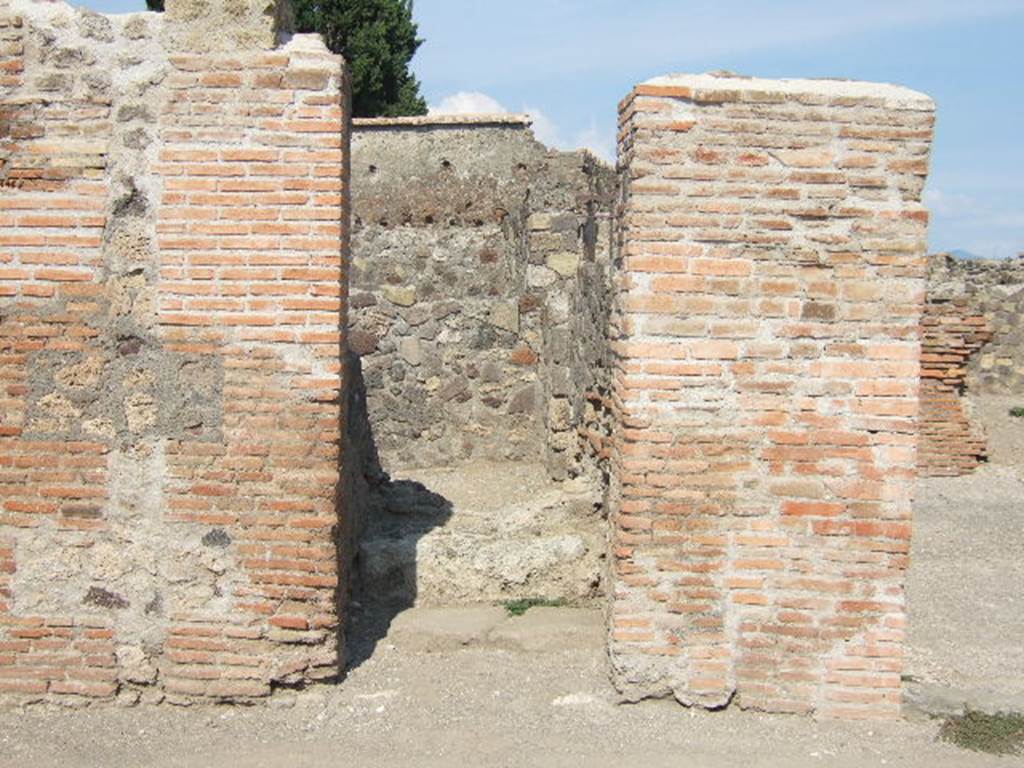 VI.1.3 Pompeii.  September 2005.  Steps to upper floor looking east.