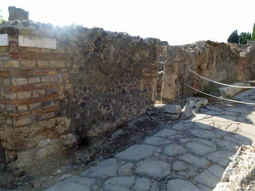 VI.1.20 Pompeii. May 2011. Looking north on Vicolo di Narciso towards entrance doorway.
Photo courtesy of Michael Binns.
