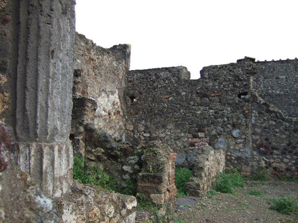 VI.1.22 Pompeii. September 2005. Two rooms on north side, looking east.