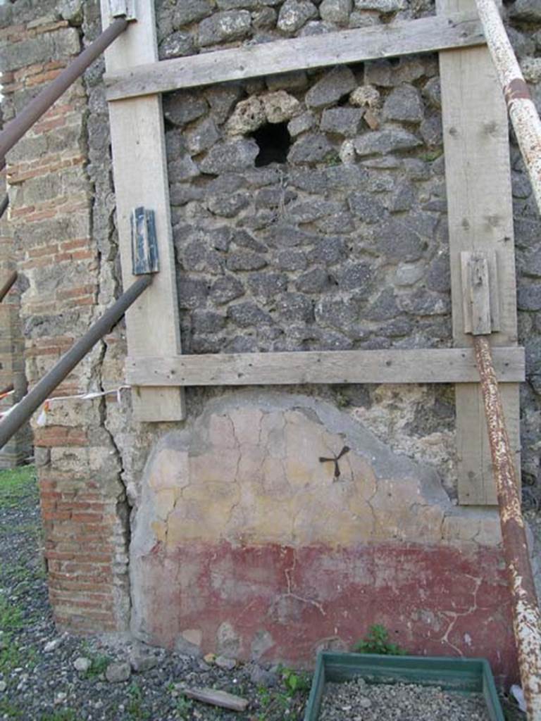 VI.8.21 Pompeii. June 2005. Wall on south-west side of tablinum, with peristyle of VI.8.20, on left. Photo courtesy of Nicolas Monteix.
