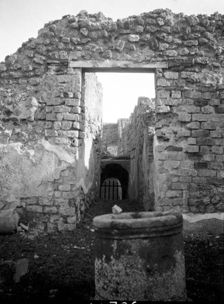 230884 Bestand-D-DAI-ROM-W.736.jpg
VI.9.5 Pompeii. W736. Looking east to puteal in pseudo-peristyle 19, and doorway to corridor 23, leading to VI.9.10.
Photo by Tatiana Warscher. With kind permission of DAI Rome, whose copyright it remains. 
See http://arachne.uni-koeln.de/item/marbilderbestand/230884 
