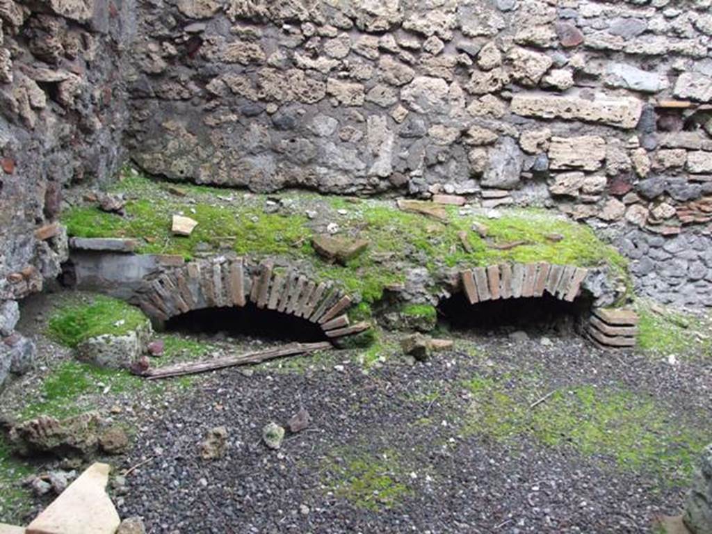 VI.9.6 Pompeii. March 2009. Room 18, hearth in kitchen and latrine.