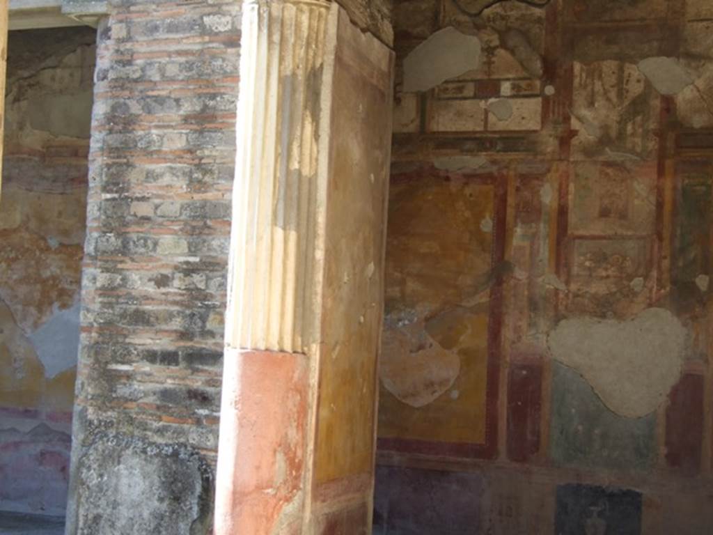 VI.9.6 Pompeii. March 2009. Room 6, looking west along north portico towards pilaster in north-west corner of peristyle. For details of wall paintings, the slaughter of the Niobids, that would have been on this pilaster, see other pilaster in south-west corner.
