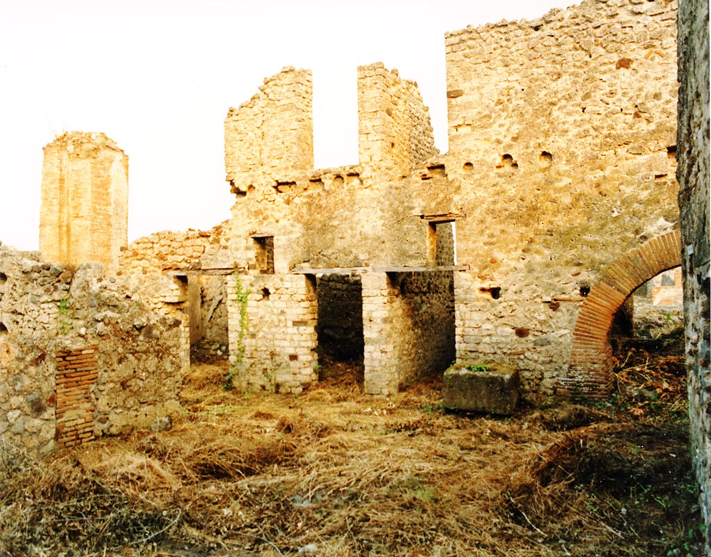 VI.14.18 Pompeii. 1987. 
Looking south-east, across atrium, with rear of water tower in Via del Vesuvio on the left. Photo courtesy of Espen B. Andersson.
