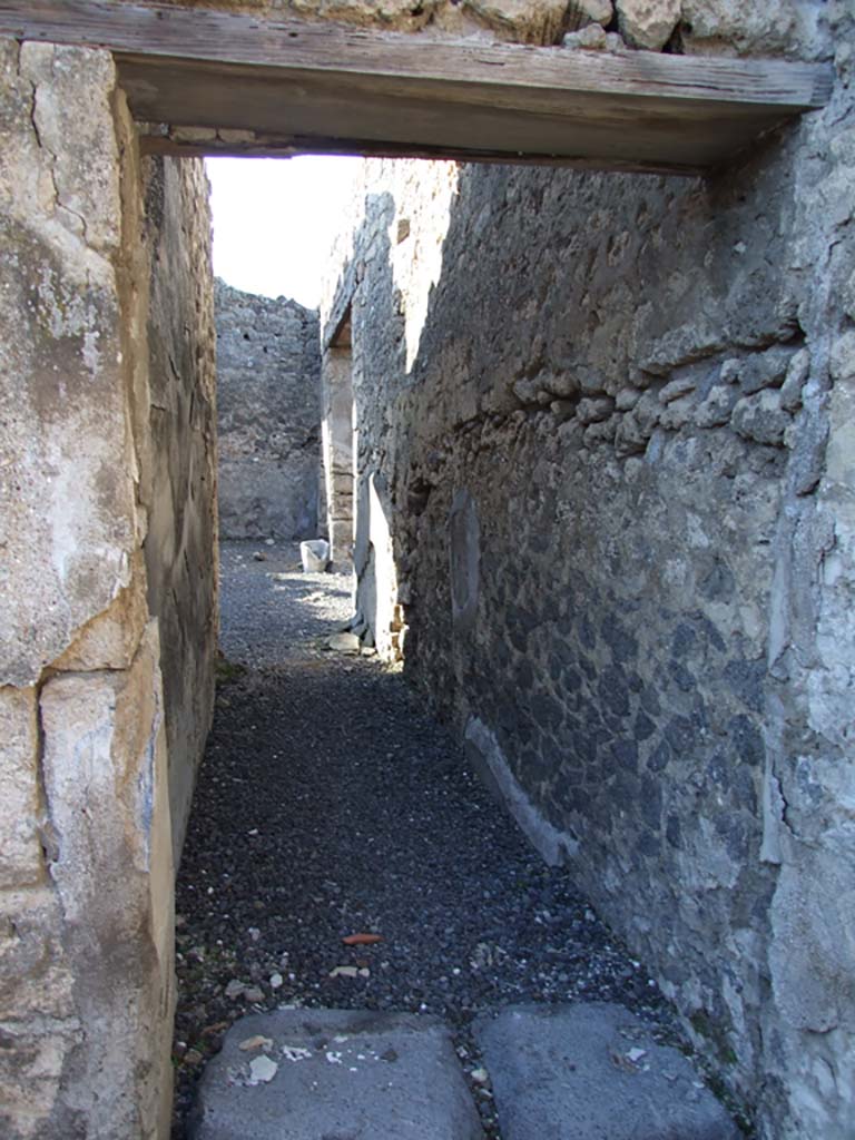 VI.14.22 Pompeii. December 2007. Room 7, corridor from atrium to peristyle looking west.