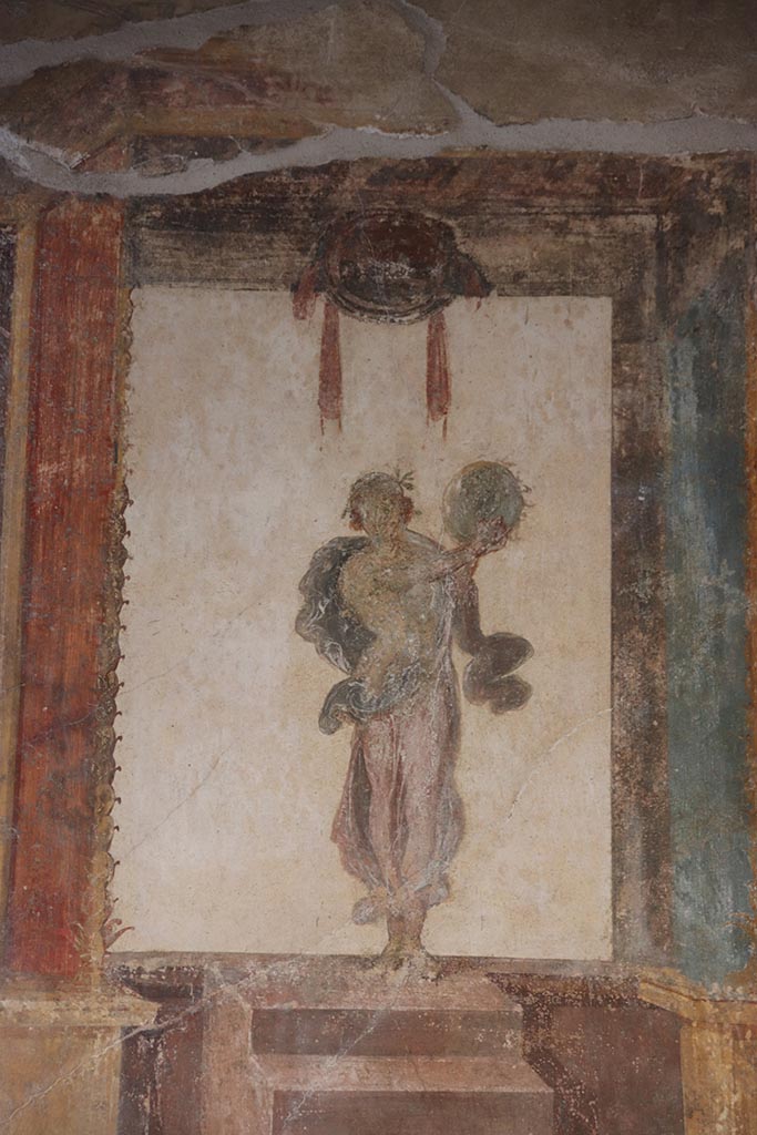 VI.15.1 Pompeii. October 2024. 
Painted figure of Muse Urania, from west end of south wall of oecus. Photo courtesy of Klaus Heese.
