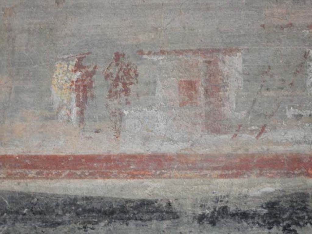 VI.16.7 Pompeii. May 2016. 
Room F, detail of lower part of painting on west wall above doorway to room R. Photo courtesy of Buzz Ferebee.

