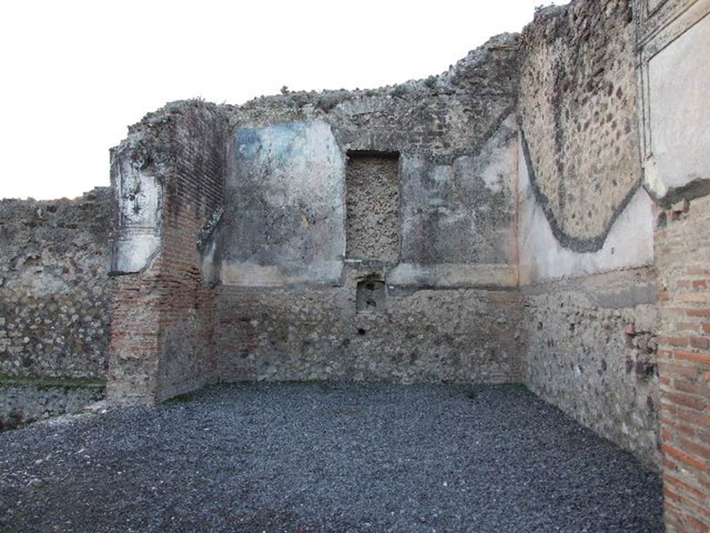 VII.1.8 Pompeii. December 2006. Nymphaeum G, west and north walls with pool D on left.