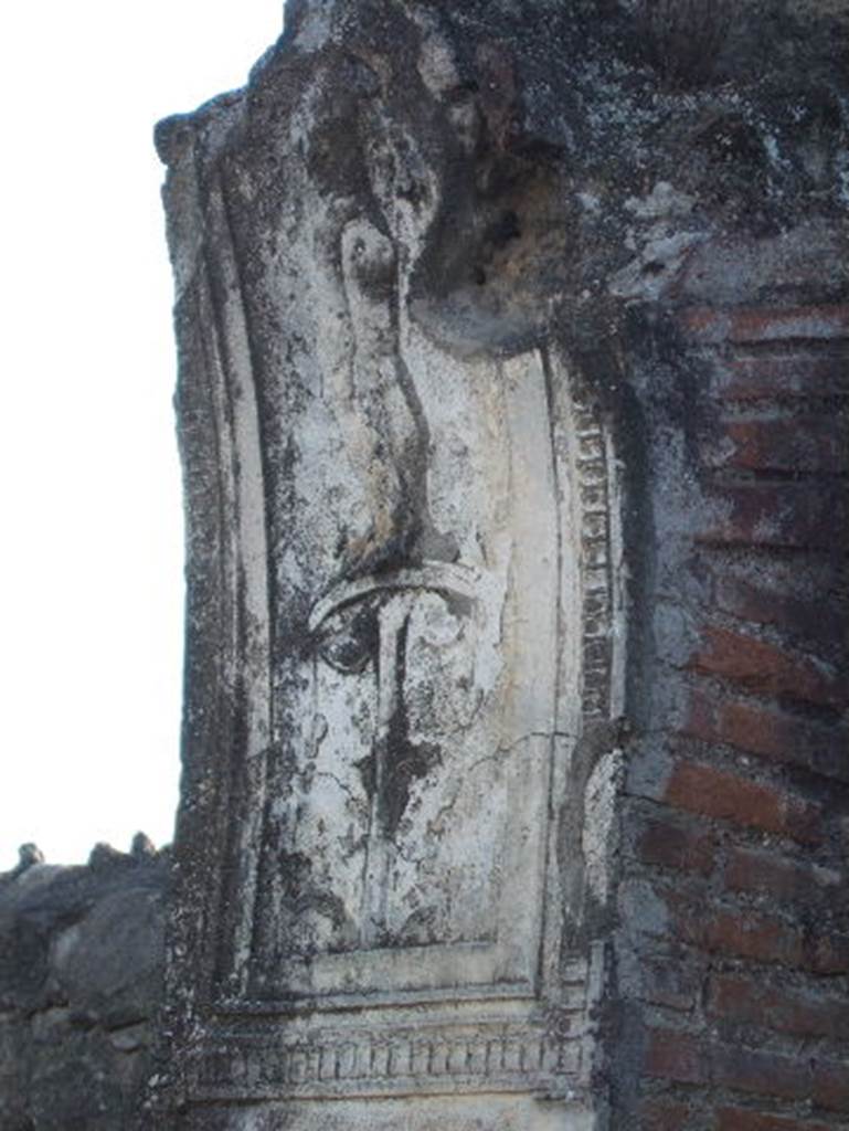 VII.1.8 Pompeii. December 2006. Nymphaeum G. Detail of arched stucco plaster on south wall.