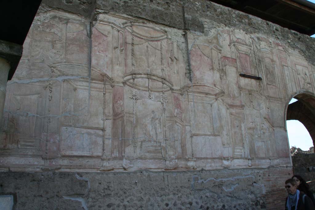 VII.1.8 Pompeii. December 2006. Detail of plaster on wall in south-west corner of gymnasium C. 