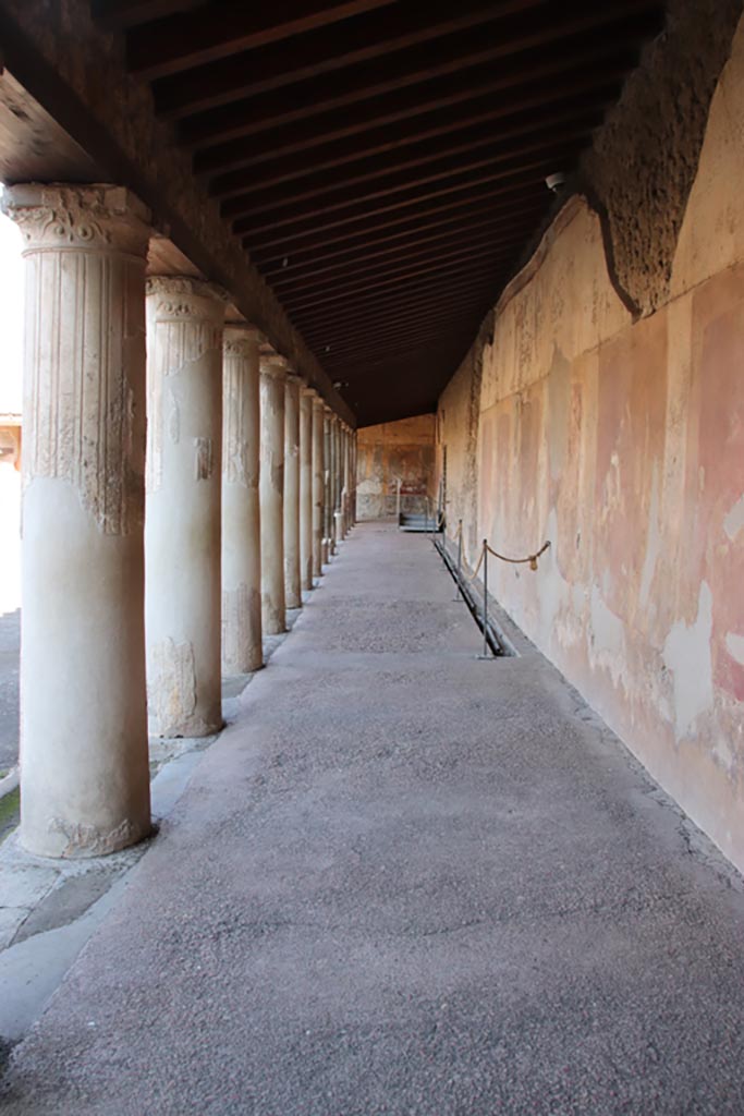 VII.1.8 Pompeii. April 2013. Corridor on east side of portico B, looking north. Photo courtesy of Klaus Heese.