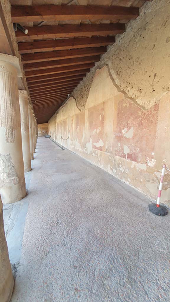 VII.1.8 Pompeii. April 2013. Corridor on east side of portico B, looking north. Photo courtesy of Klaus Heese.