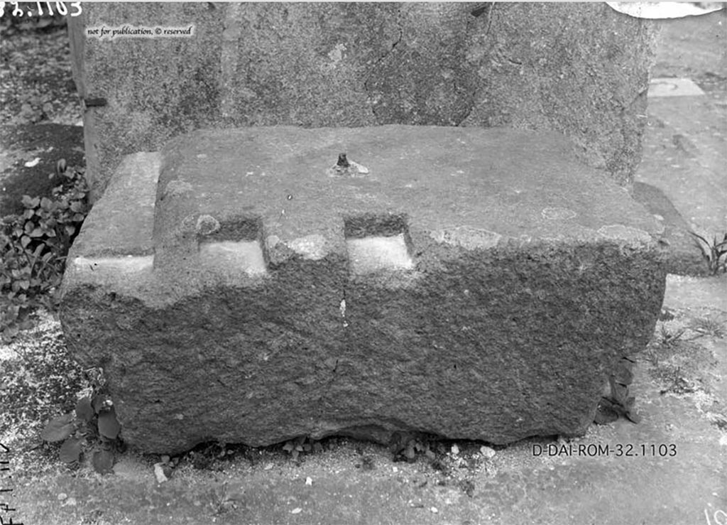 VII.1.47/25 Pompeii. 1932. 
Money-chest base in south-west corner of atrium between doorway to room 4, on left, and entrance corridor, on right.
According to Pernice –
Found in hipped Tuscanic Atrium with marble impluvium, labrum as fountain, marble table, travertine cistern, arca, on the right cupboard.
The back is broken; the stone was probably twice as large, but then broke through in the middle, one half was turned over and fitted with a fastening pin and reused.
See Pernice, E., 1932. Hellenistische Tische, Zisternenmündungen, Beckenuntersätze, Altäre u. Truhen. Berlin, p. 74, Taf. 44.3.
DAIR 32.1103. Photo © Deutsches Archäologisches Institut, Abteilung Rom, Arkiv. 
Thanks to Espen B. Andersson for assisting us in our interest in money-chests.
