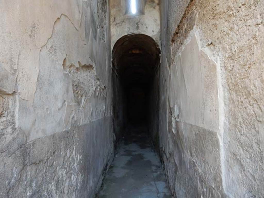 VII.1.48 Pompeii. May 2015. Looking east along corridor K. 
This leads to apodyterium (changing room) 11 of the womens baths.
Photo courtesy of Buzz Ferebee.
