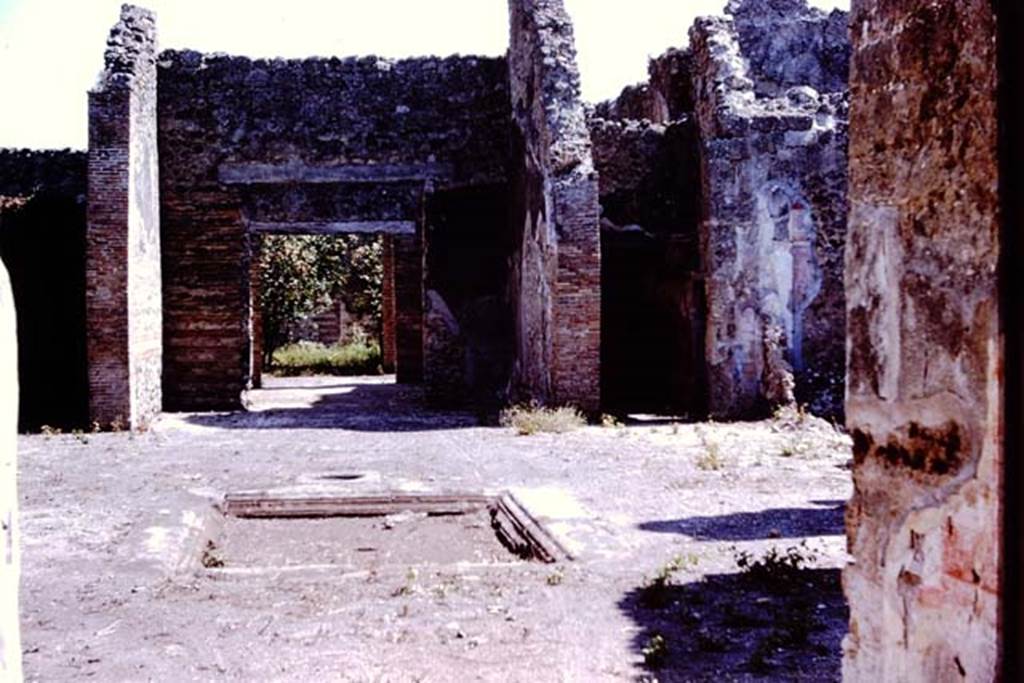 VII.2.20 Pompeii. 1966. Looking south across atrium from end of entrance corridor.  Photo by Stanley A. Jashemski.
Source: The Wilhelmina and Stanley A. Jashemski archive in the University of Maryland Library, Special Collections (See collection page) and made available under the Creative Commons Attribution-Non Commercial License v.4. See Licence and use details.
J66f1011
