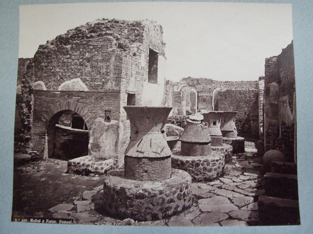 VII.2.22 Pompeii. Bakery of Popidius Priscus. Oven and mills. Old undated photograph. 
Courtesy of Society of Antiquaries. Fox Collection.
