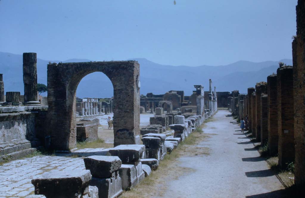VII.8.00 Pompeii. 1950s. Looking south along west side of Forum.  Photo courtesy of Rick Bauer.

