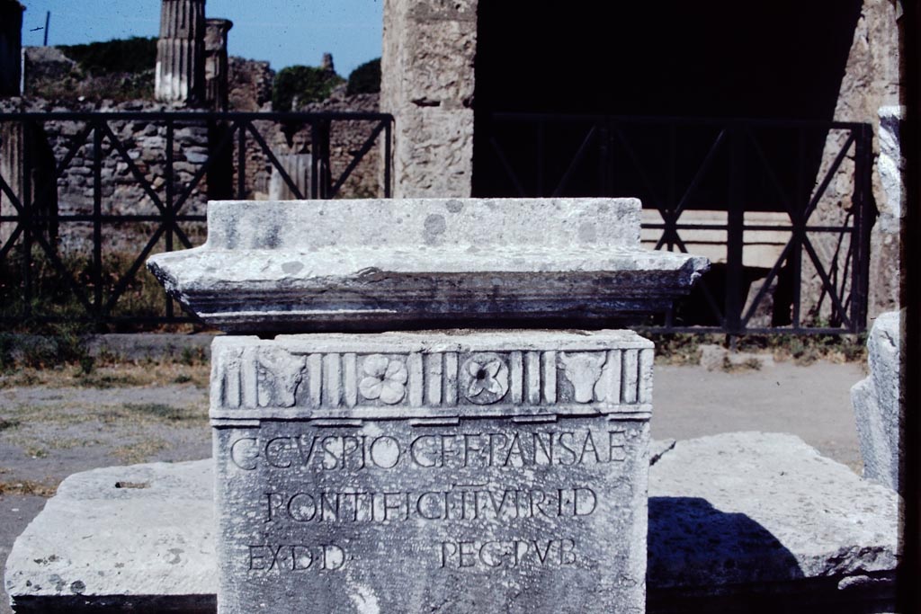 VII.8 Pompeii Forum. 1968. 
Pedestal base for statue, decorated with bull's heads and flower motifs, looking west. Photo by Stanley A. Jashemski.
Source: The Wilhelmina and Stanley A. Jashemski archive in the University of Maryland Library, Special Collections (See collection page) and made available under the Creative Commons Attribution-Non-Commercial License v.4. See Licence and use details.
J68f0992

