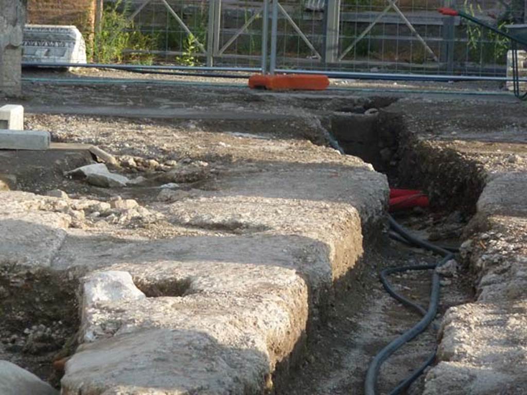 Forum, west side, September 2015. Looking south at detail of surface below the west portico in south-west corner.