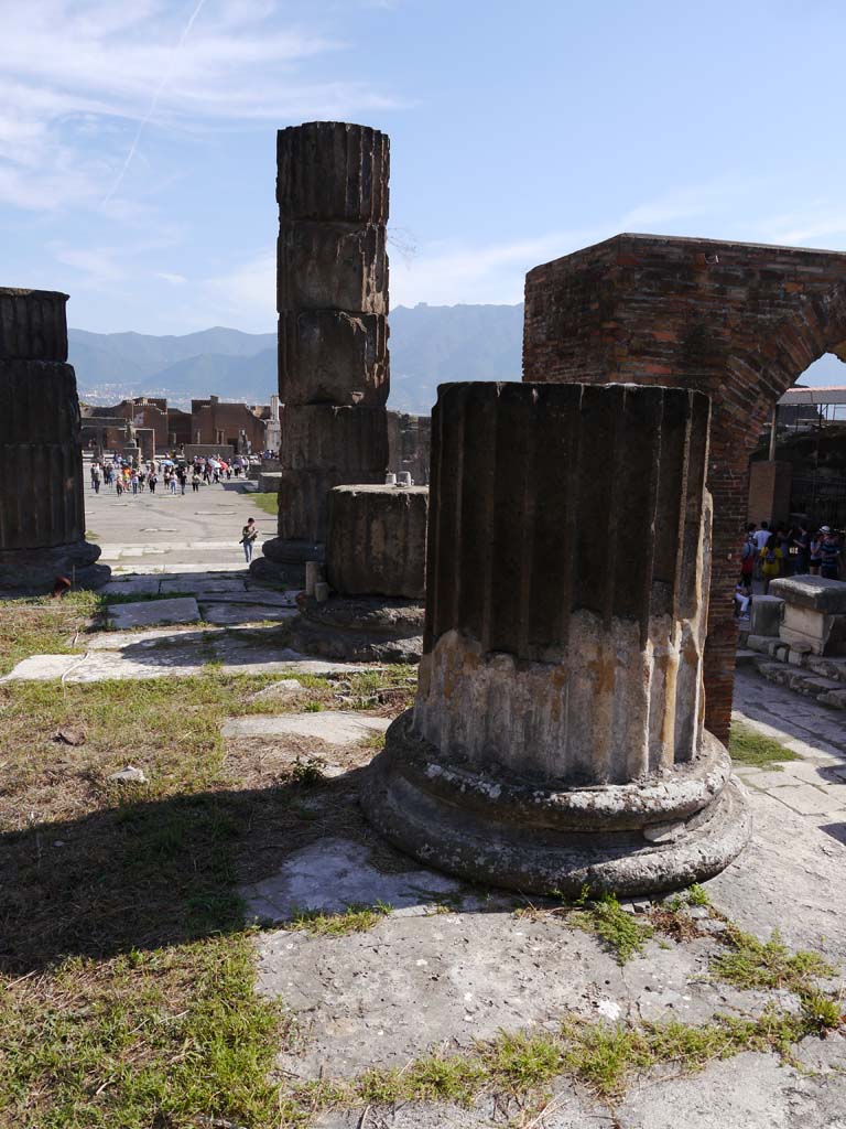 VII.8.1 Pompeii. July 2011.
Temple of Jupiter, steps leading up the podium on west side. 
Photo courtesy of Rick Bauer.
