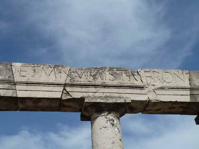 VII.9.1 Pompeii. October 2020. Eumachia’s Building portico, detail of part of inscription. Photo courtesy of Klaus Heese.