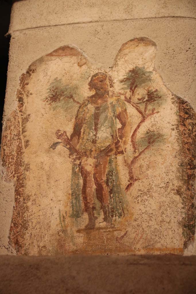 VII.12.18 Pompeii. April 2014.  
Wall painting of Priapus in front of a fig tree, with double phallus, from the upper frieze in the middle of the north wall.
Photo courtesy of Klaus Heese.
