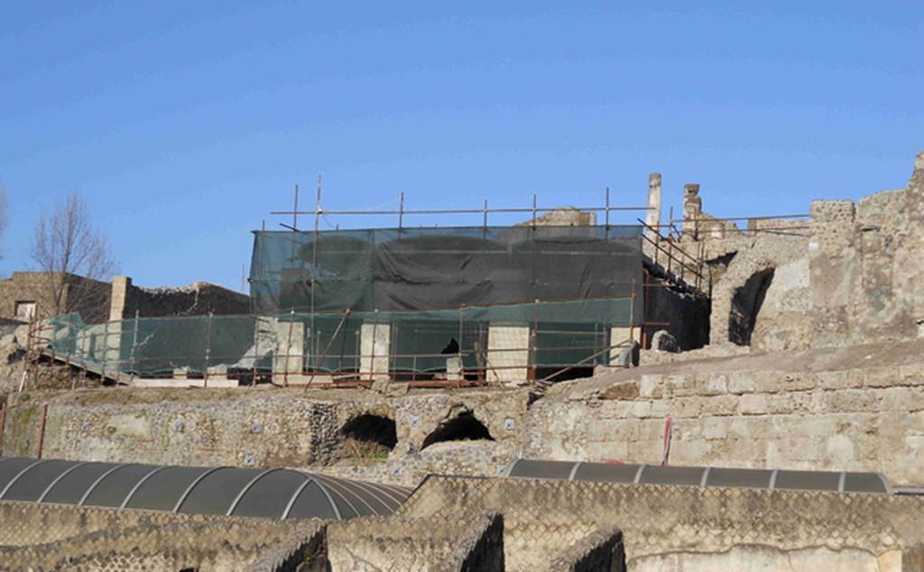 VII.16.13 Pompeii. February 2011. Restoration work in progress on the middle level at the rear of VII.16.13. Photo courtesy of Guy de la Bedoyere.