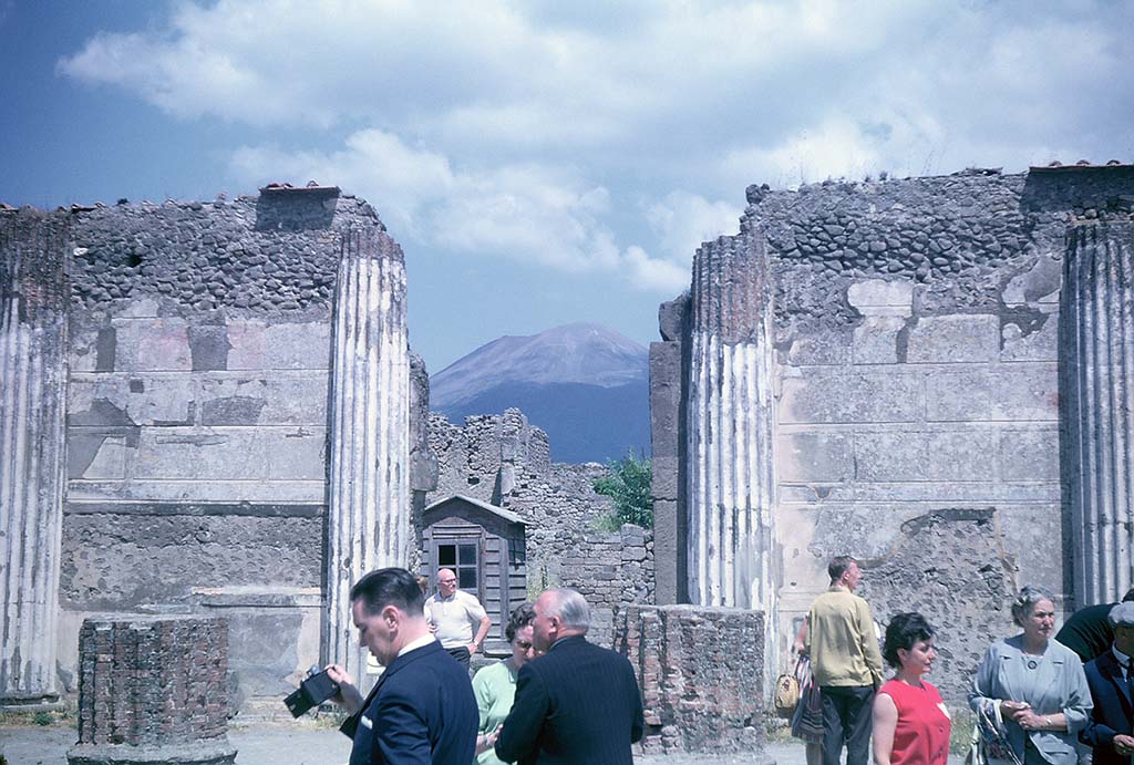 VIII.1.1 Pompeii. June 1962. Looking north to doorway VIII.1.2 from Basilica onto Via Marina. Photo courtesy of Rick Bauer.