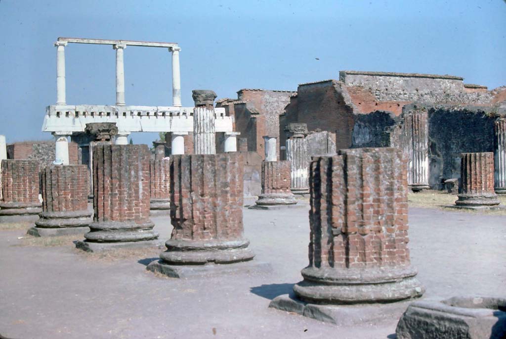 VIII.1.1 Pompeii, 7th August 1976. Looking south-east across Basilica towards south end of Forum.
Photo courtesy of Rick Bauer, from Dr George Fay’s slides collection.

