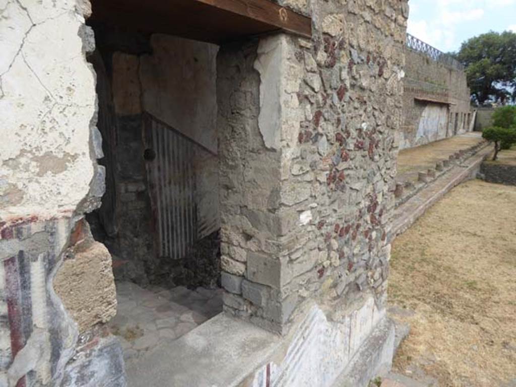 VIII.1.a, Pompeii. June 2017. Looking through window to steps, at north end of portico. Photo courtesy of Michael Binns.