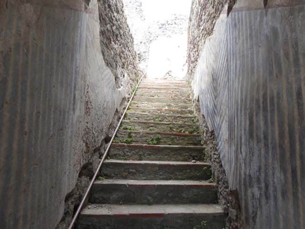 VIII.1.a, Pompeii. June 2017. Looking east up steps from landing with window overlooking outside steps. Photo courtesy of Michael Binns.

