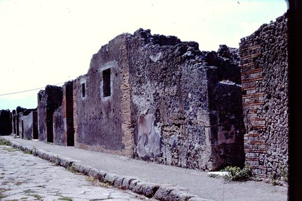 VIII.2.16 Pompeii, on left with white marble sill. 1968. West side of Via delle Scuole, looking south. 
The marble sill of the entrance doorway on the right belongs to VIII.2.13. Photo by Stanley A. Jashemski.
Source: The Wilhelmina and Stanley A. Jashemski archive in the University of Maryland Library, Special Collections (See collection page) and made available under the Creative Commons Attribution-Non-Commercial License v.4. See Licence and use details.
J68f1187

