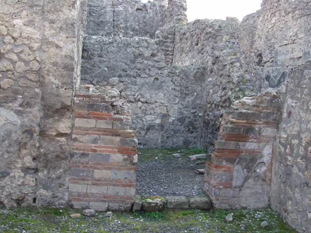 VIII.3.7 Pompeii. December 2007. Doorway to rear room in south-west corner of shop.