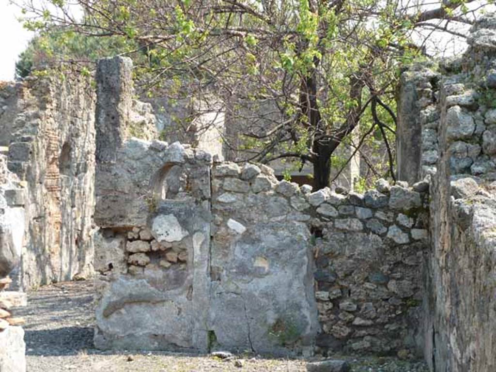 VIII.3.21 Pompeii. May 2010. Looking east to end of entrance corridor, on south side of garden area.