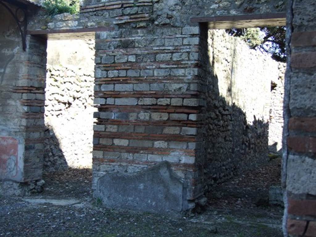 VIII.5.37 Pompeii.  March 2009. Doorways to Rooms 4 and 2, on east side of Atrium.