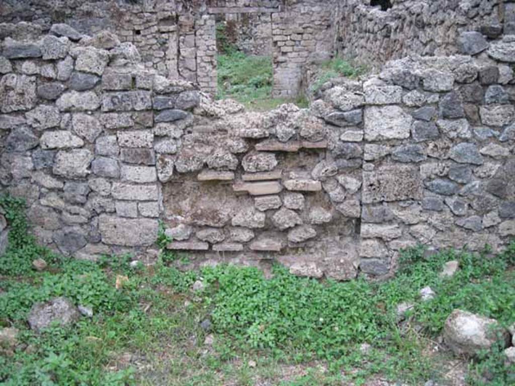 VIII.7.4 Pompeii. September 2010. West wall of rear room. Photo courtesy of Drew Baker.